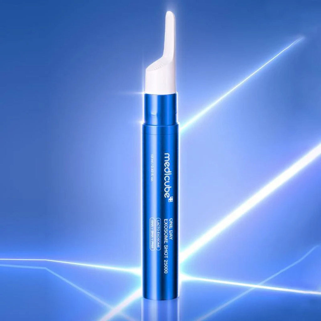 Refect Beauty Medicube One Day Exosome Shot Pore Ampoule 25000 in a sleek blue applicator against a neon light background