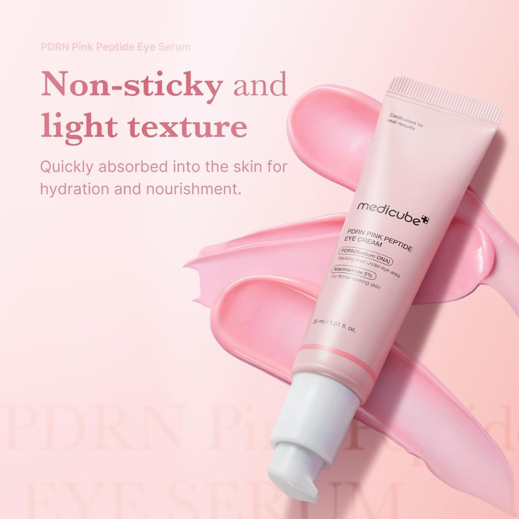 Refect Beauty Medicube PDRN Pink Peptide eye cream tube with light pink serum texture on a soft pink background