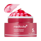 Refect Beauty Medicube TXA Niacinamide Capsule Cream in a pink jar with visible red gel and pink capsules