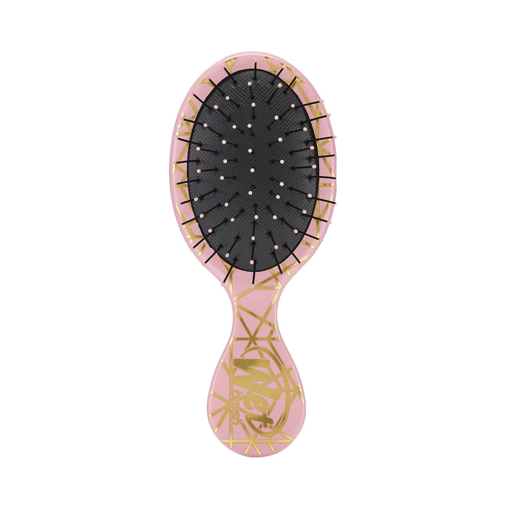 Refect Beauty Wet Brush mini detangling hairbrush in pink with gold geo hearts pattern and flexible black bristles