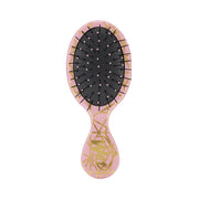 Refect Beauty Wet Brush mini detangling hairbrush in pink with gold geo hearts pattern and flexible black bristles