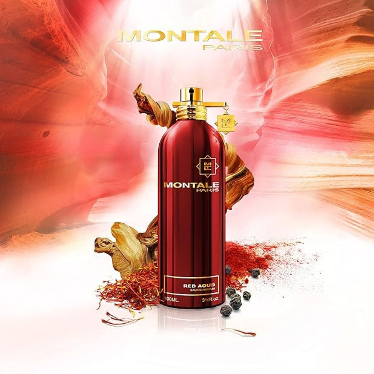 Refect Beauty Montale Red Aoud unisex eau de parfum in a metallic red bottle surrounded by saffron and peppercorns.