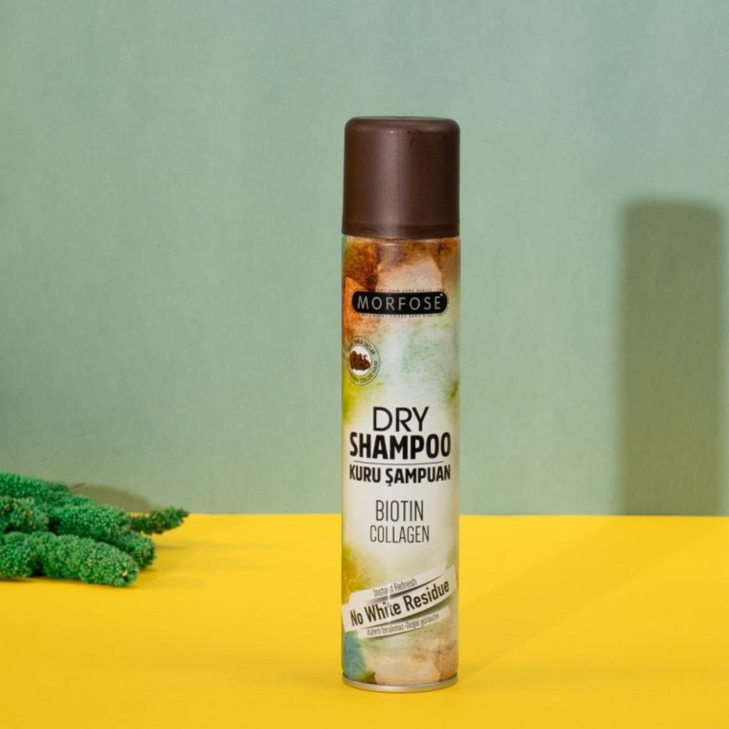 Refect Beauty MORFOSE dry shampoo for brown hair with biotin and collagen in a spray can on a yellow and green surface