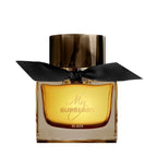 Refect Beauty My Burberry Black Eau de Parfum in a glass bottle with a black ribbon and dark amber liquid.