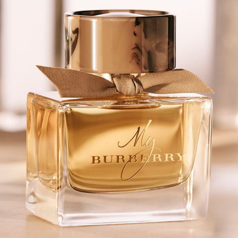 Refect Beauty My Burberry Eau de Parfum in a glass bottle with a gold cap and a decorative brown ribbon bow.