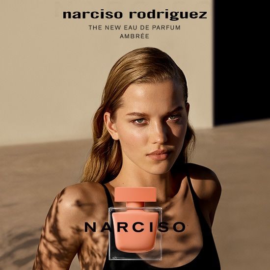 Refect Beauty Narciso Ambree Eau de Parfum bottle with a woman in sun-kissed lighting and floral shadow patterns