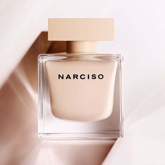 Refect Beauty Narciso Poudree Eau de Parfum in a sleek, square glass bottle with a soft beige powdery finish.