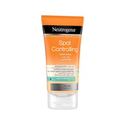 Refect Beauty Neutrogena Spot Controlling facial scrub in an orange and white squeeze tube for acne-prone skin