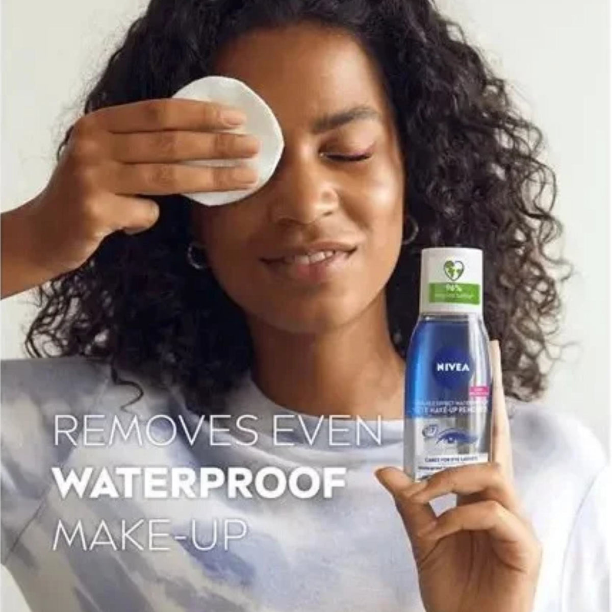 Refect Beauty model using Nivea Double Effect Eye Make-Up Remover on a cotton pad to gently clean her eye area