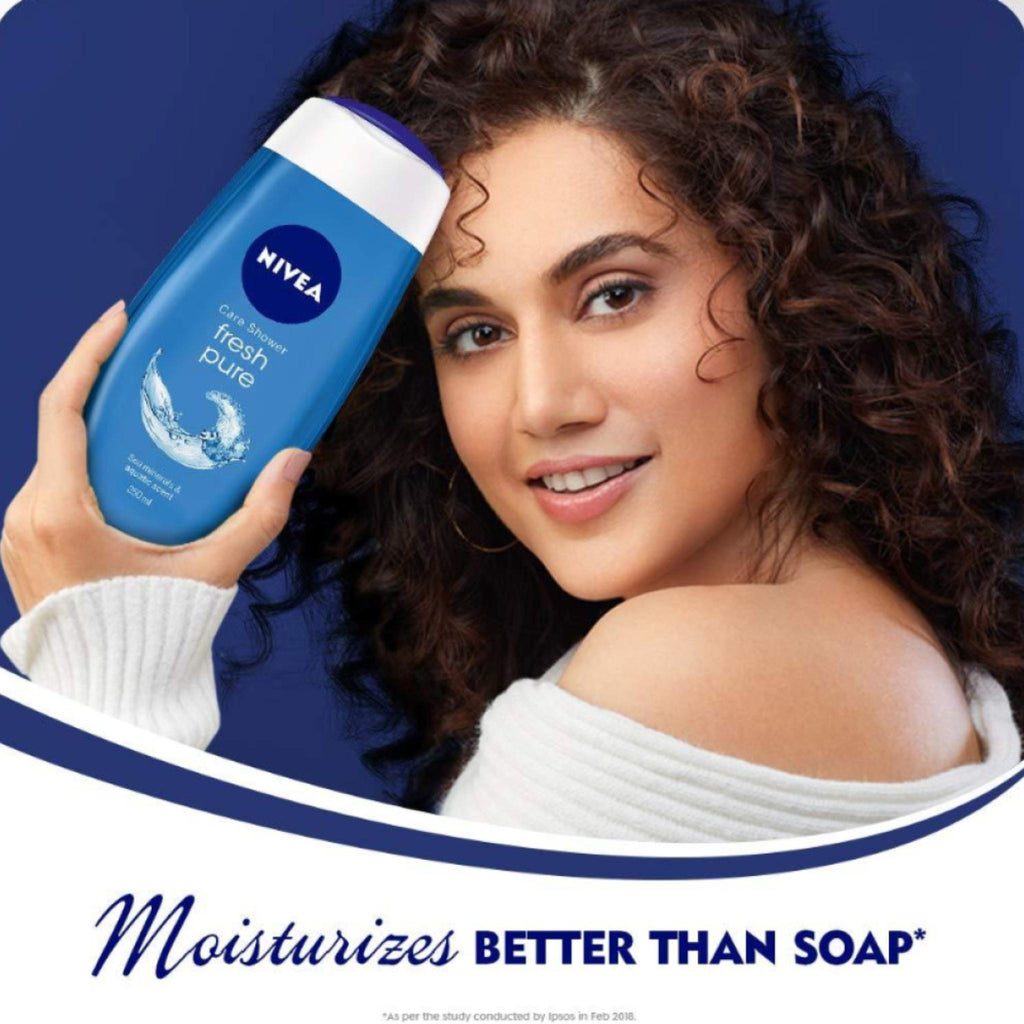 Refect Beauty model holding a blue Nivea Fresh Pure shower gel bottle with marine minerals for hydrated skin