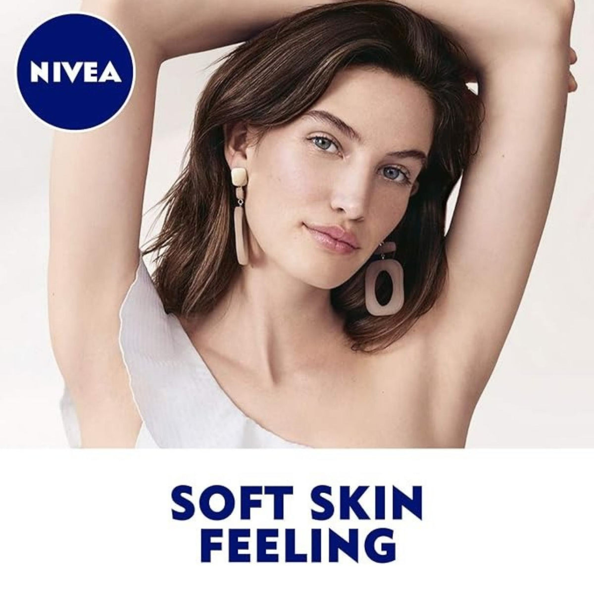 Refect Beauty model with arms raised showcasing smooth underarms for Nivea Powder Touch anti-perspirant roll-on
