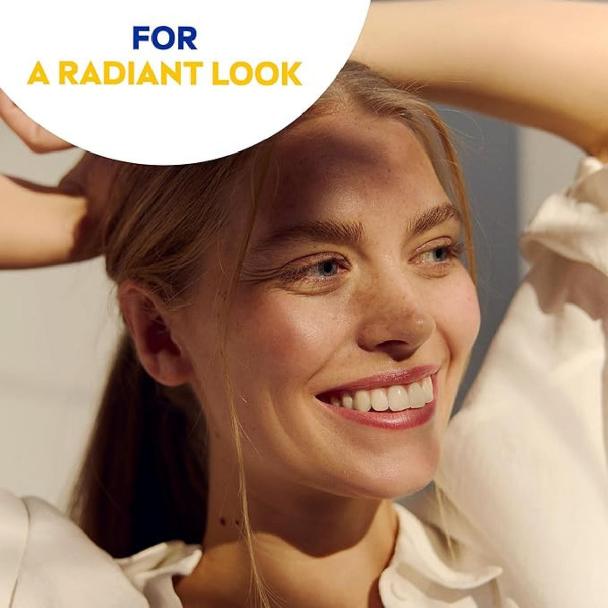 Refect Beauty Nivea Sun Anti-Age Q10 SPF 50 cream shown with a smiling woman enjoying a radiant sunlit look