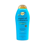 Refect Beauty OGX Renewing Argan Oil of Morocco conditioner in a blue bottle with a gold cap for dry damaged hair 577ml