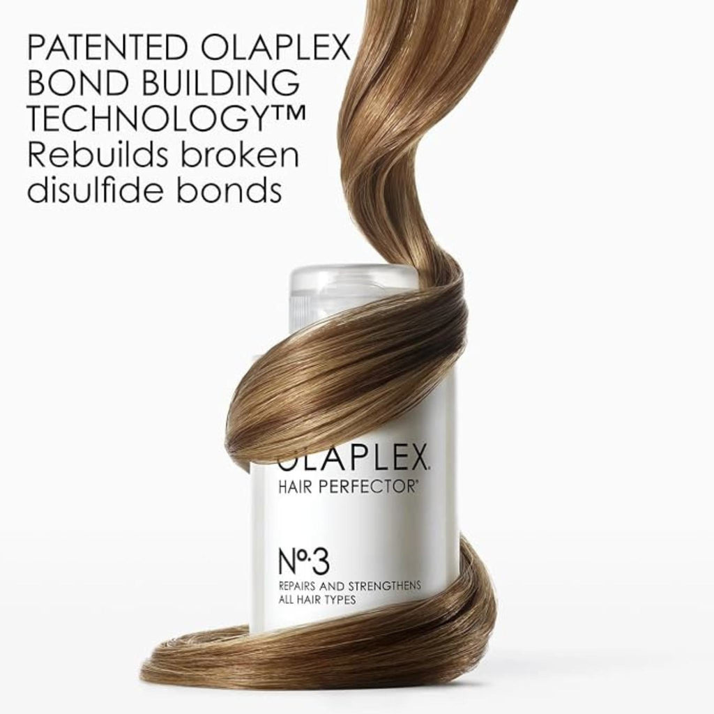 Refect Beauty Olaplex No.3 Hair Perfector bottle wrapped in a lock of healthy brown hair