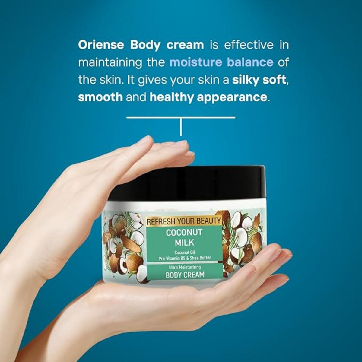 Refect Beauty Oriense Coconut Milk Body Cream jar held in hands against a blue background for deep skin hydration.