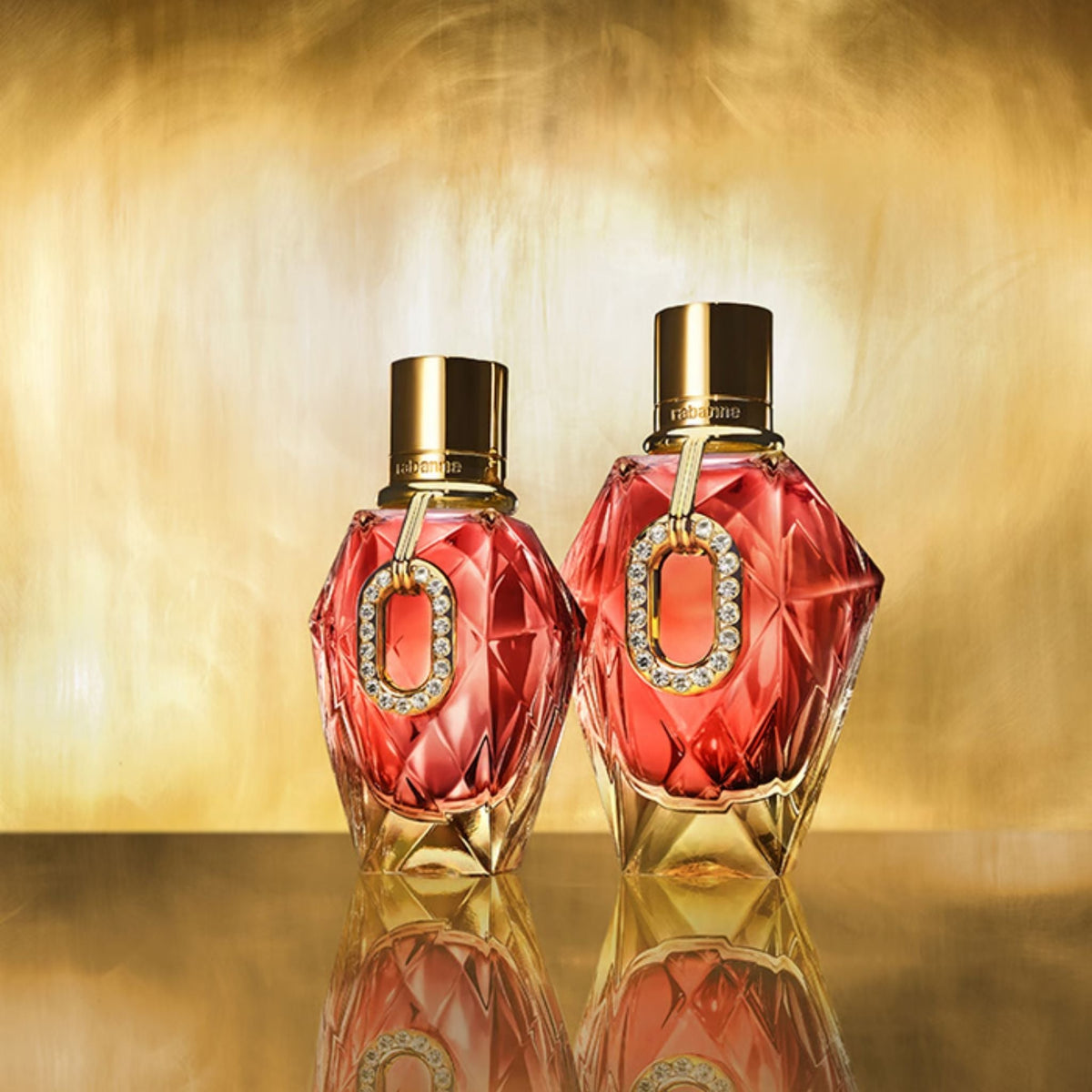 Refect Beauty Paco Rabanne Million Gold Pure Diamonds perfume bottles with red faceted glass and gold accents