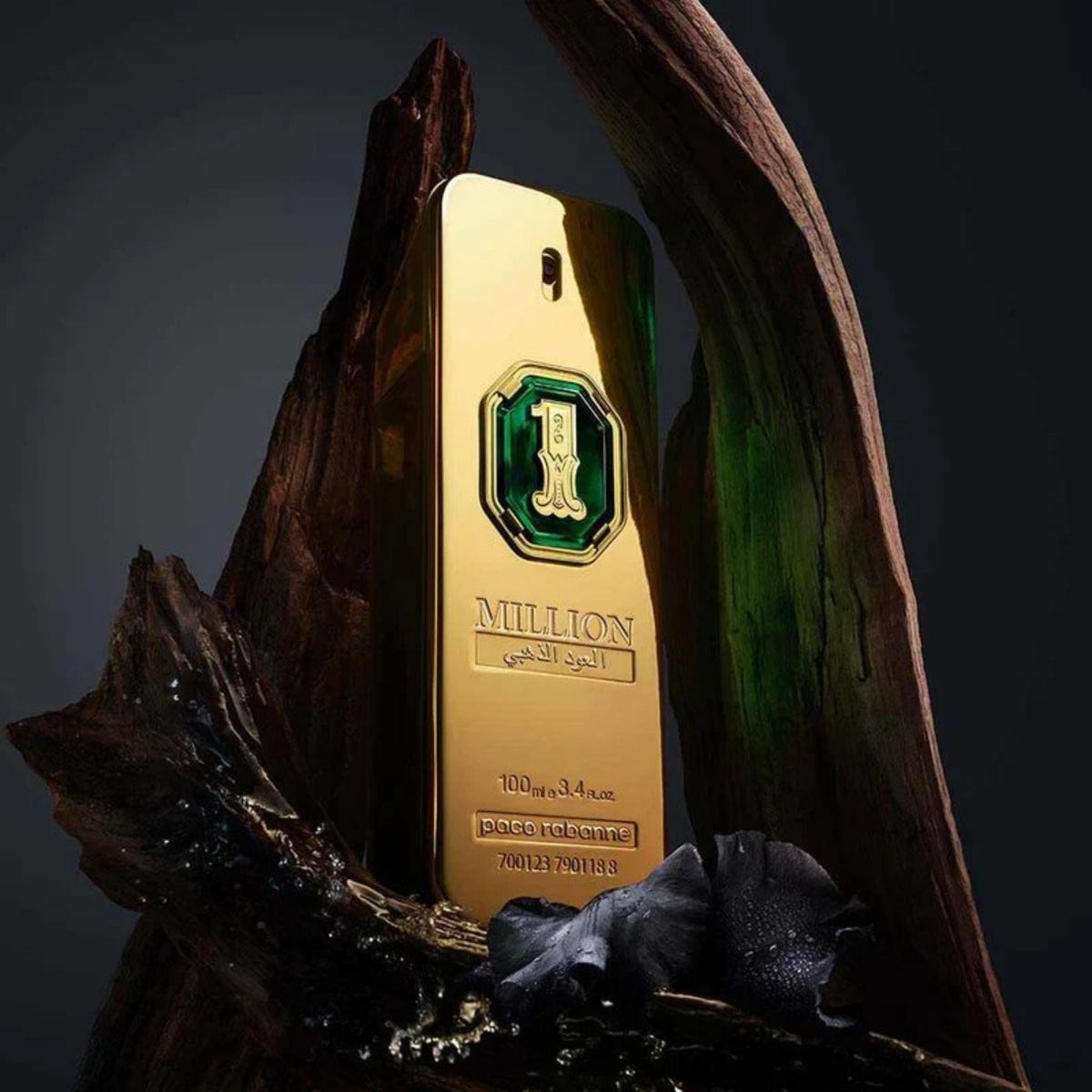 Refect Beauty Paco Rabanne One Million Golden Oud Parfum Intense bottle nestled in dark wood and black flowers