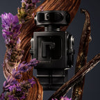 Refect Beauty Paco Rabanne Phantom Parfum bottle surrounded by lavender sprigs and vanilla beans on dark background