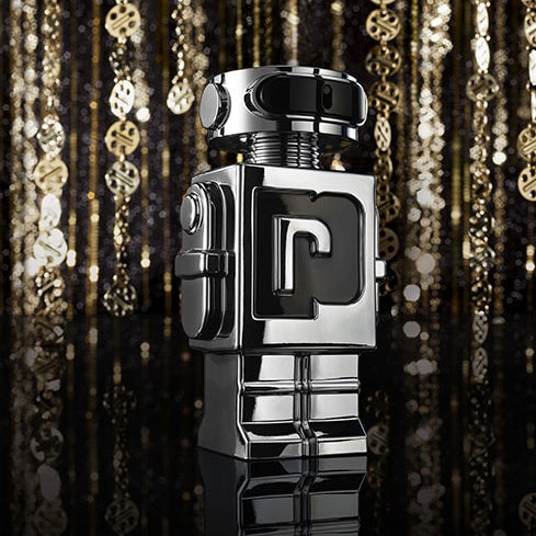 Refect Beauty paco rabanne Phantom Eau de Toilette in a futuristic silver robot-shaped bottle on a dark background.