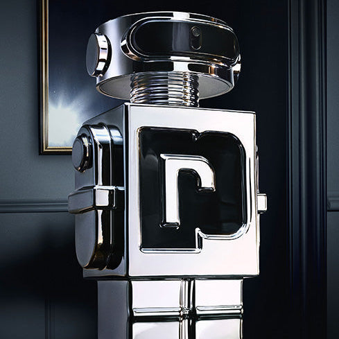 Refect Beauty Paco Rabanne Phantom Eau de Toilette in a futuristic silver robot-shaped bottle against a dark background