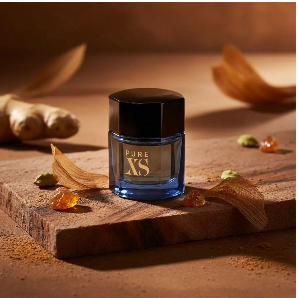 Refect Beauty Paco Rabanne Pure XS Eau de Toilette in a blue glass bottle with black cap on a rustic wooden surface