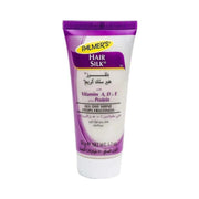 Refect Beauty Palmers Hair Silk leave-in cream in a 50g tube for frizz control and shine with vitamins A, D, and E.