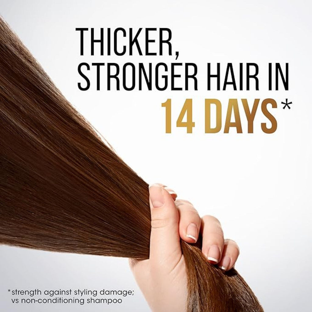 Refect Beauty Pantene Pro-V Smooth & Silky shampoo advertisement showing a hand holding healthy, thick brown hair.