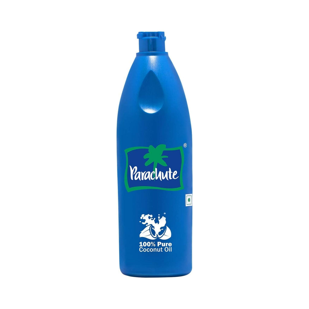 Refect Beauty Parachute 100% pure coconut oil in a blue plastic bottle for hair and skin nourishment