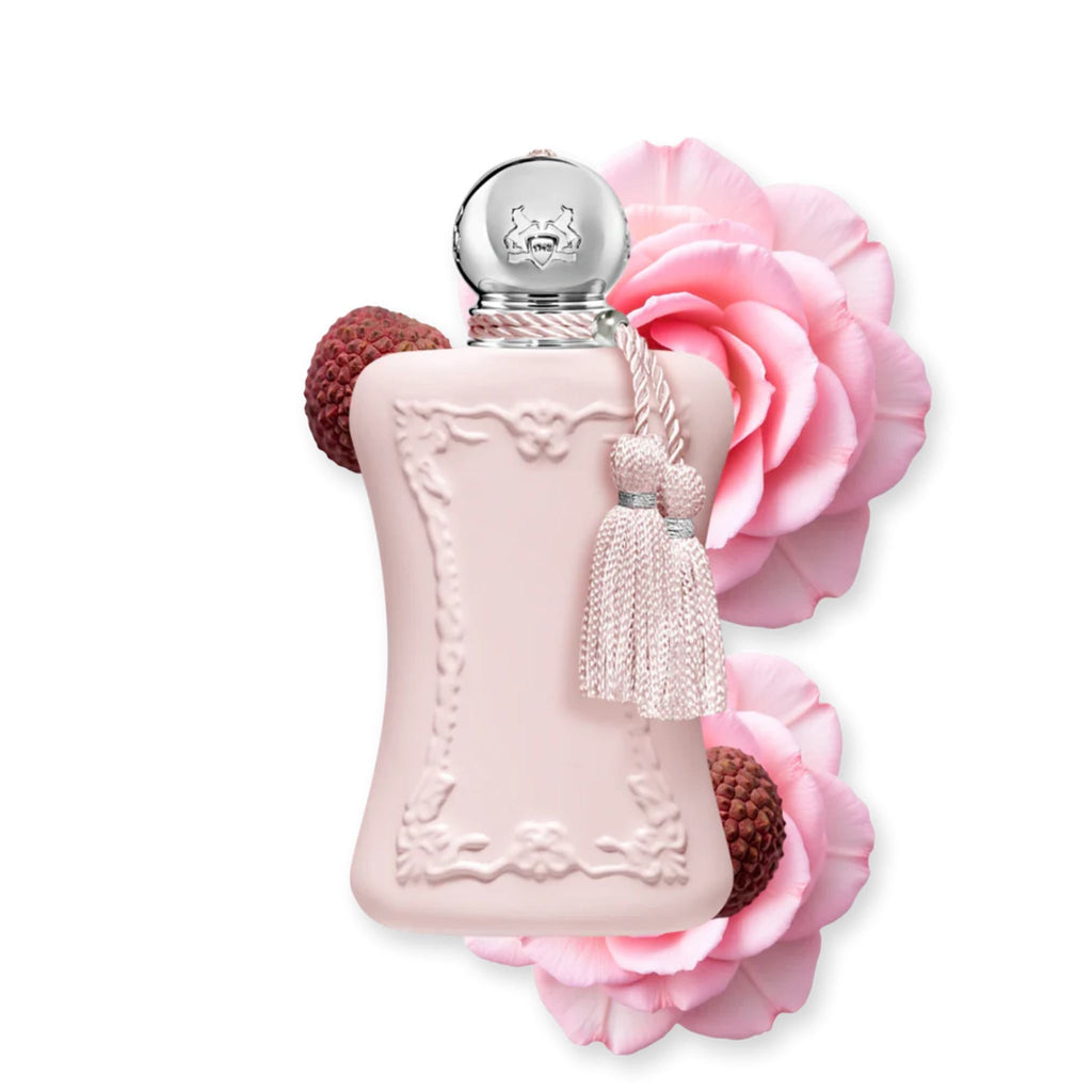 Refect Beauty Parfums de Marly Delina Eau de Parfum in a pink bottle with a tassel, lychee, and pink rose petals.