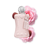 Refect Beauty Parfums de Marly Delina Eau de Parfum in a pink bottle with a tassel, lychee, and pink rose petals.