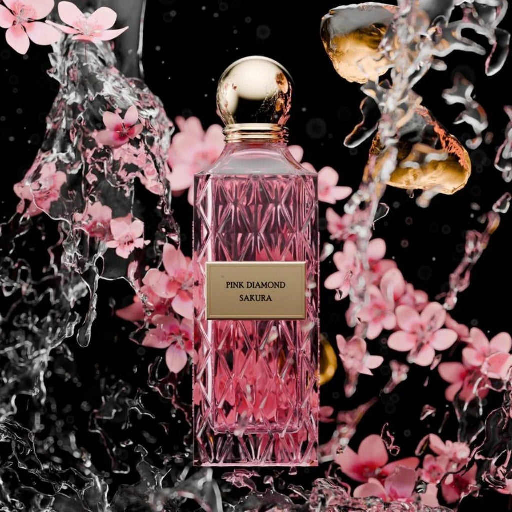 Refect Beauty Ibrahim Al Qurashi Pink Diamond Sakura perfume bottle surrounded by cherry blossoms and water splashes