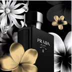 Refect Beauty Prada L'Homme Intense Eau de Parfum bottle in matte black against a background of gold and white flowers