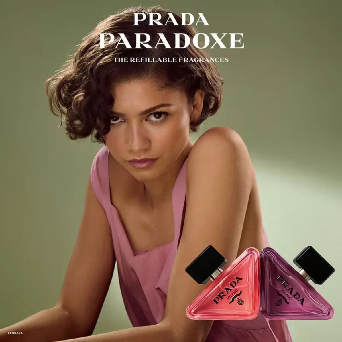Refect Beauty Prada Paradoxe Intense perfume bottles with Zendaya in a pink dress against a soft green background