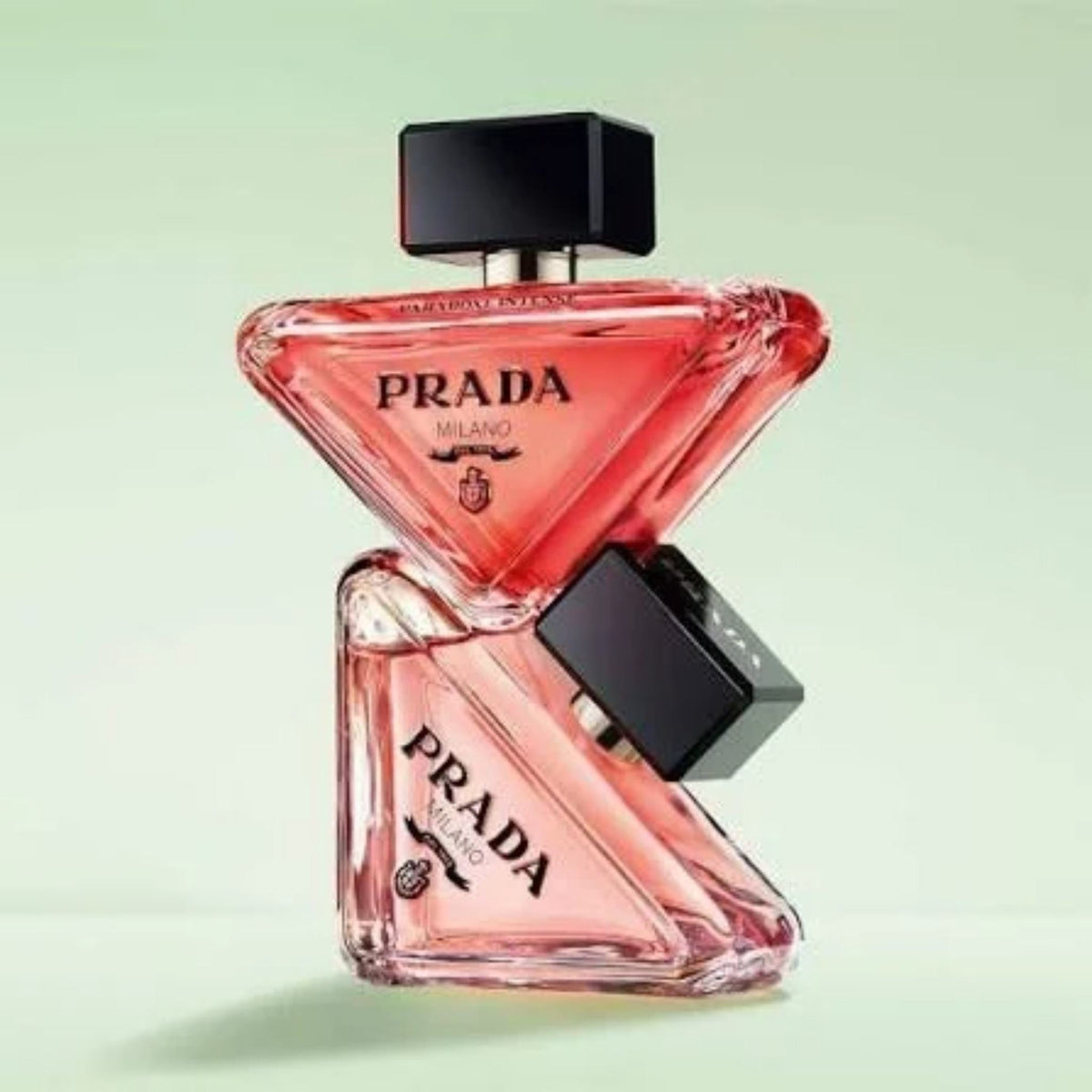 Refect Beauty Prada Paradoxe Intense Eau de Parfum in a unique triangular glass bottle with a black cap