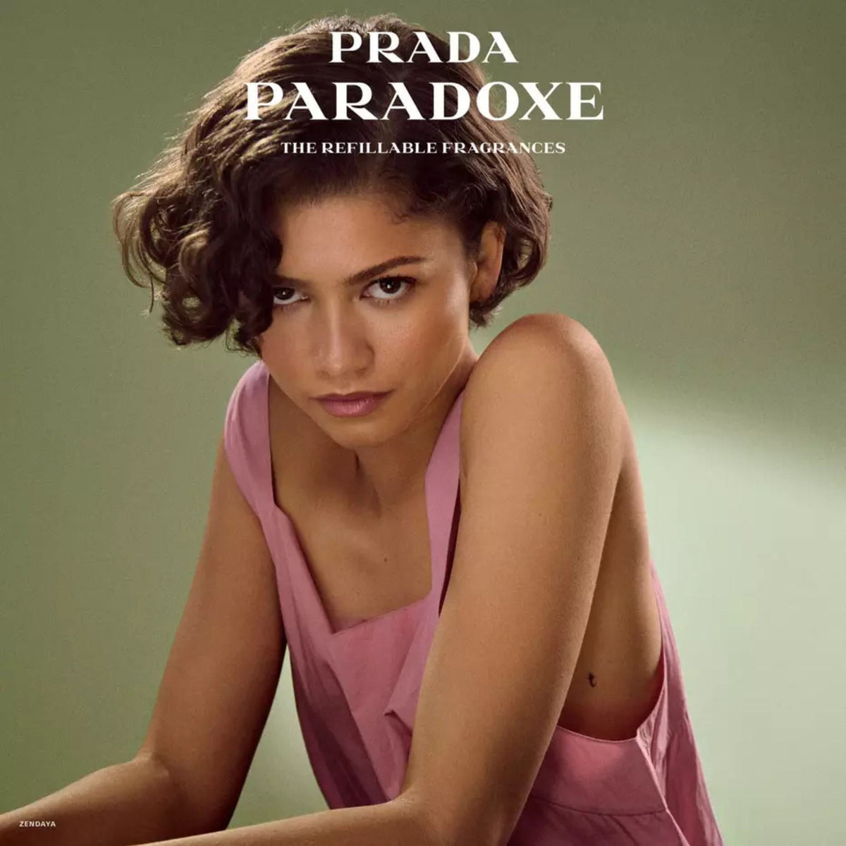 Refect Beauty campaign featuring Zendaya for Prada Paradoxe Virtual Flower perfume in a soft pink sleeveless top