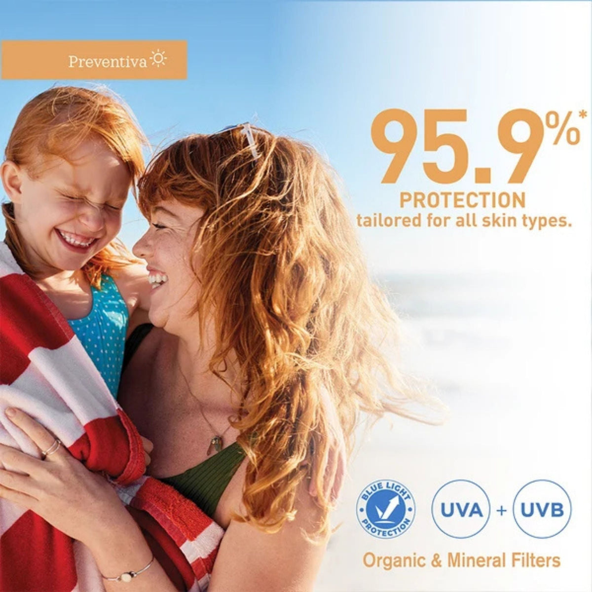 Refect Beauty PREVENTIVA SPF 50+ spray sunscreen being applied to a laughing mother and daughter at the beach