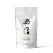 Refect Beauty Hair Addict Pure Cassia hair treatment powder in a white resealable pouch for conditioning and shine.