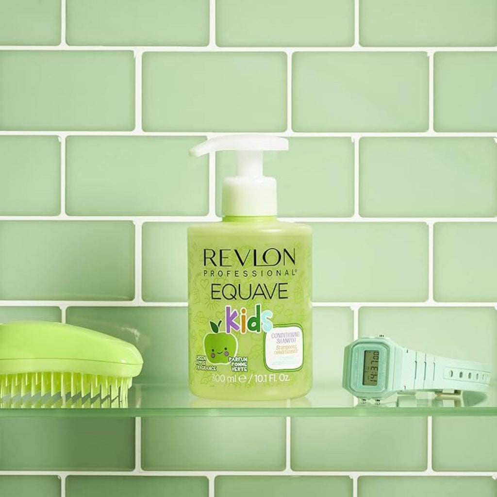 Refect Beauty Revlon Professional Equave Kids green apple shampoo bottle on a shelf with a hairbrush and watch.
