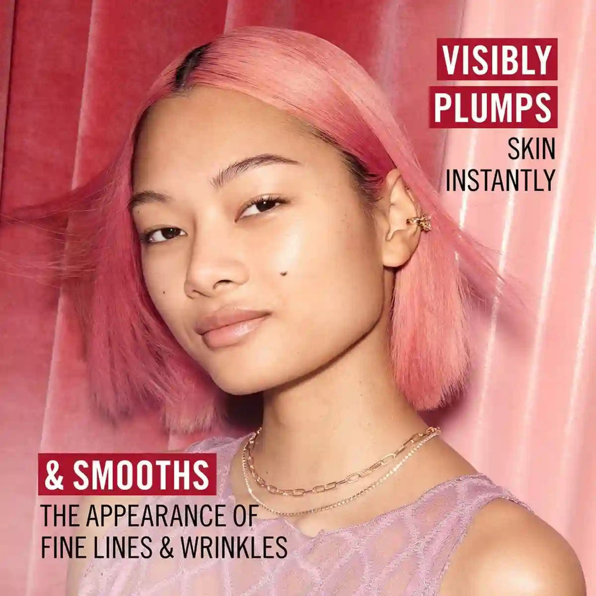 Refect Beauty model with pink hair showcasing smooth skin after using Rimmel Lasting Finish Hydration Boost Primer