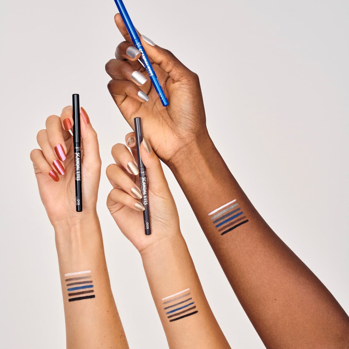 Refect Beauty Rimmel London Scandaleyes Exaggerate waterproof eyeliner pencils with colour swatches on models' arms