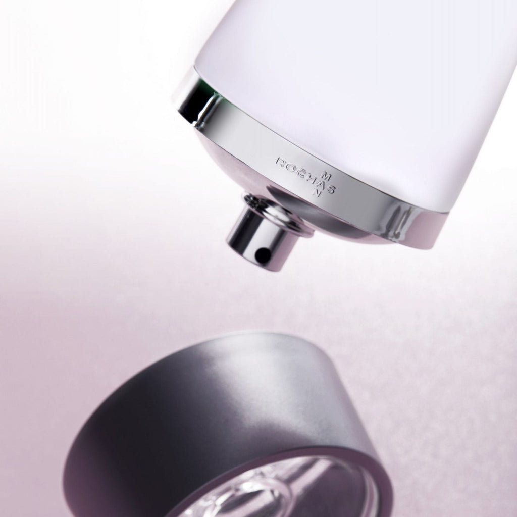 Refect Beauty Rochas Man Eau de Toilette bottle with silver cap detail and modern minimalist design