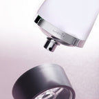 Refect Beauty Rochas Man Eau de Toilette bottle with silver cap detail and modern minimalist design