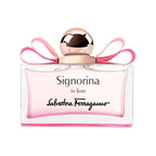 Refect Beauty Salvatore Ferragamo Signorina In Fiore Eau de Toilette in a glass bottle with a pink bow and gold cap.