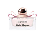 Refect Beauty Salvatore Ferragamo Signorina Eau de Parfum in a clear glass bottle with a pink bow and rose gold cap