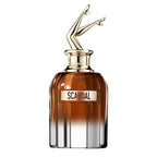 Refect Beauty Jean Paul Gaultier Scandal Elixir Parfum in a dark amber glass bottle with iconic gold legs cap