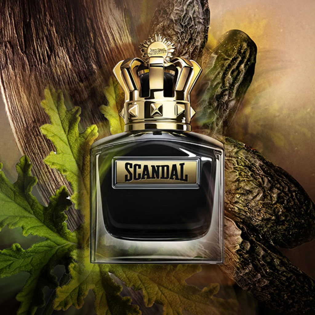 Refect Beauty Jean Paul Gaultier Scandal Pour Homme fragrance bottle with a gold crown cap against a textured background