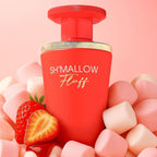 Refect Beauty French Avenue Sh’mallow Fluff perfume bottle surrounded by soft marshmallows and fresh strawberries.