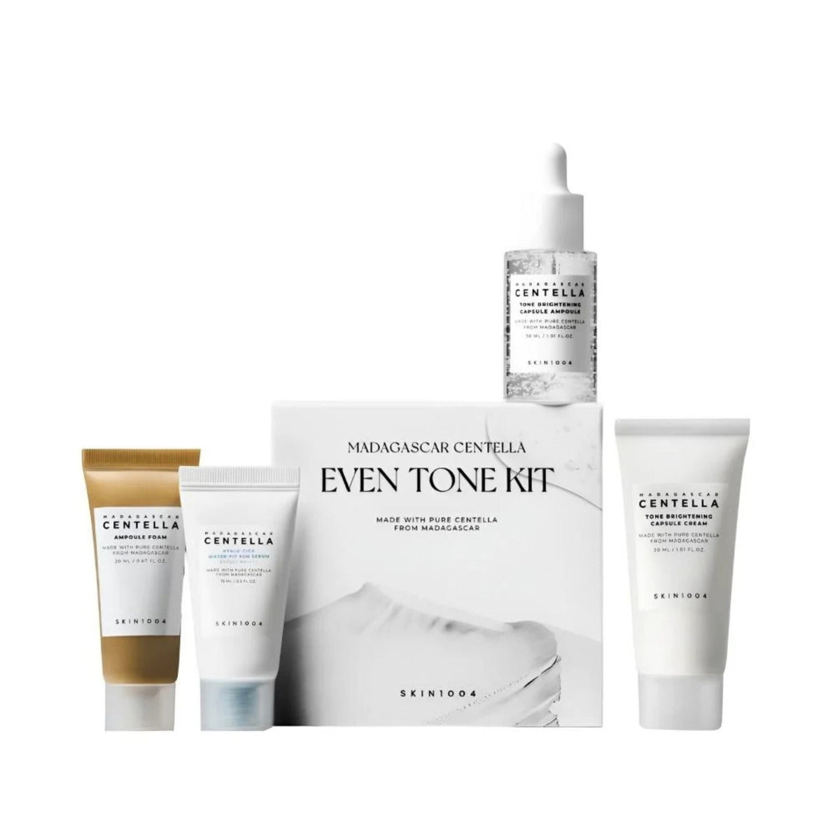 Refect Beauty SKIN1004 Madagascar Centella Even Tone Kit featuring cleanser, ampoule, cream, and sun serum bottles.
