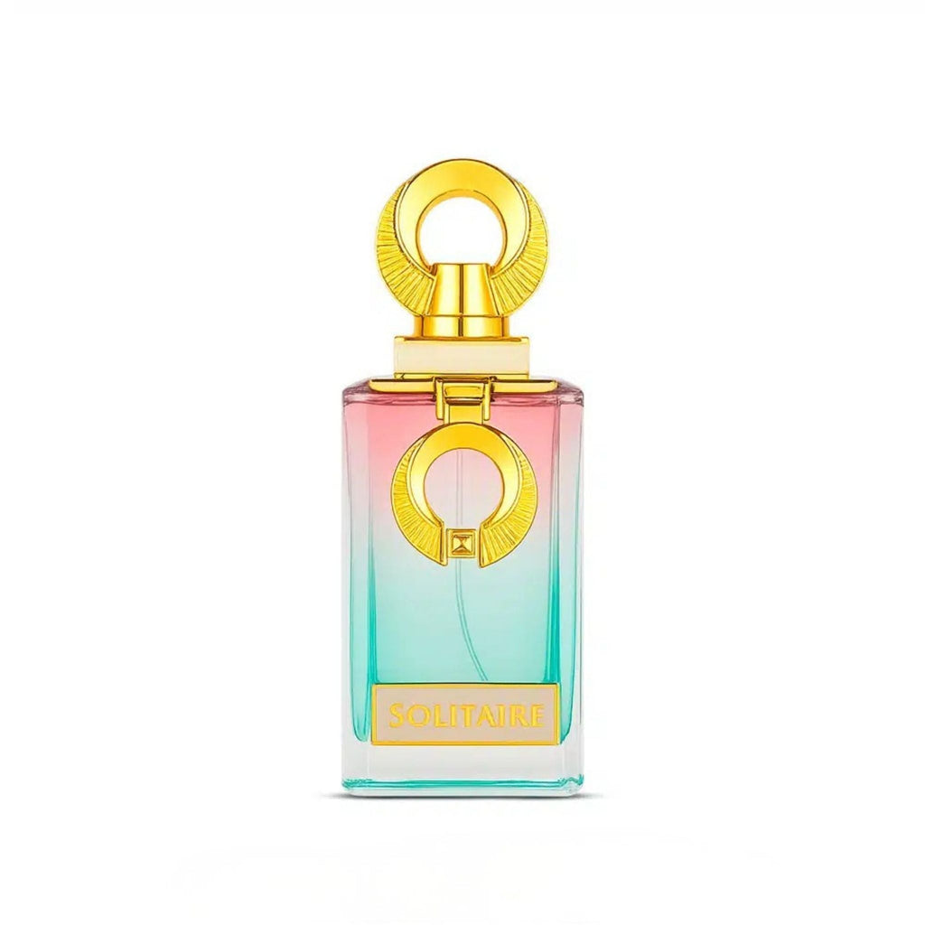 Refect Beauty French Avenue Solitaire extrait de parfum bottle with a gradient pink and teal glass and gold cap.