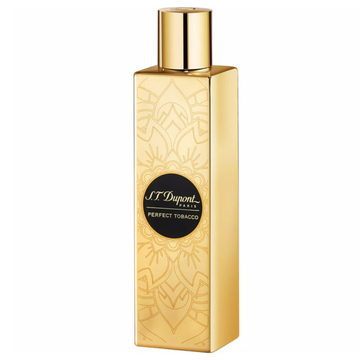 Refect Beauty S.T.Dupont Perfect Tobacco eau de parfum in a tall, rectangular gold bottle with intricate engravings.